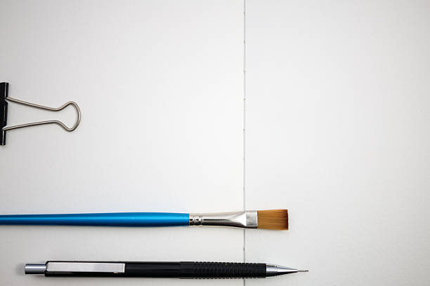 A vibrant collection of colorful stationery items is arranged for creative projects