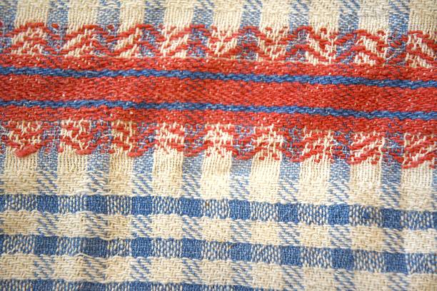 Blue checkered kitchen towel used as a clean background representing domestic lifestyle, simplicity, home kitchen atmosphere, and minimal composition in natural condition with strong Copy Space for design and food concepts.