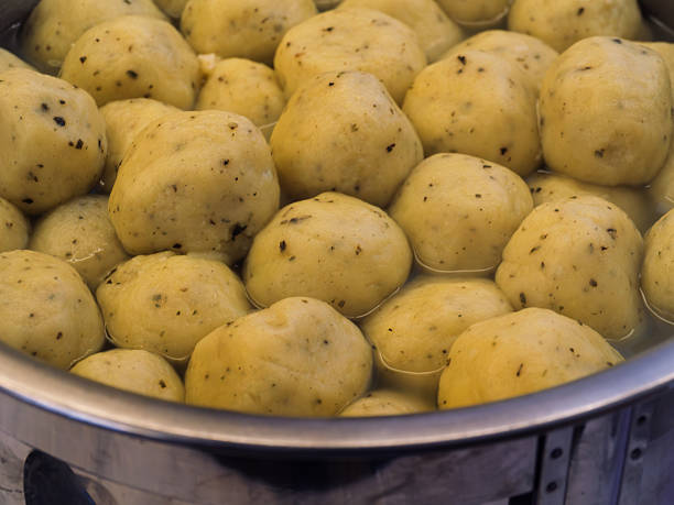 Fluffy Potato Dumplings Cooking in a Steamer
