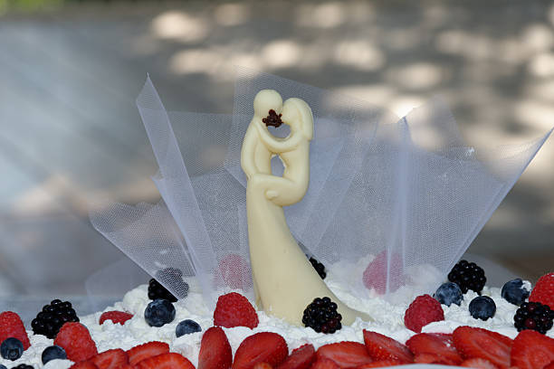 wedding cake with cream, chocolate and fruit