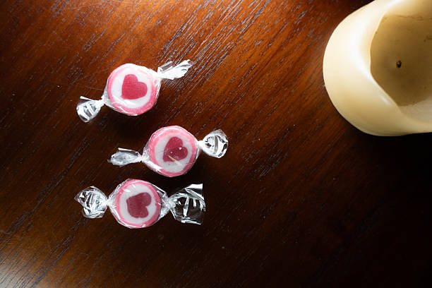 Candies on a wooden table