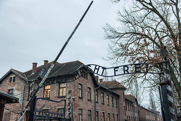 February 15, 2026, Poland. Auschwitz-Birkenau gate with the infamous Arbeit Macht Frei sign, serving as a solemn memorial and historical site dedicated to Holocaust victims in Owicim, Poland