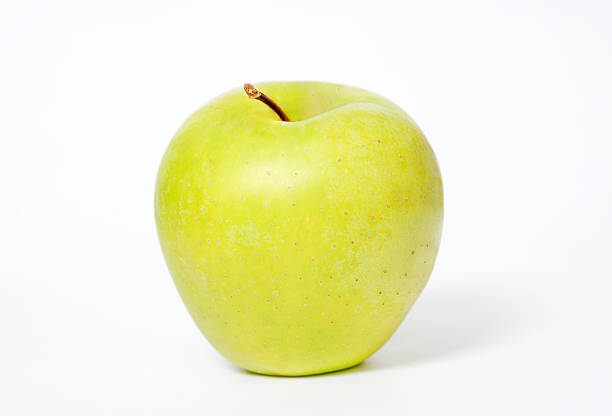 Golden apples in grocery market