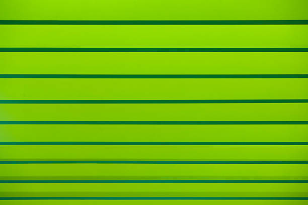 Green striped abstract background. Geometric color gradient. Minimal composition