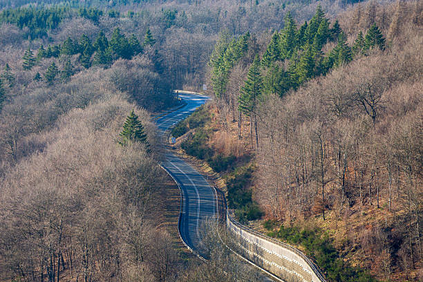 Forest view with highway, German countryside.\nWelder - Germany.