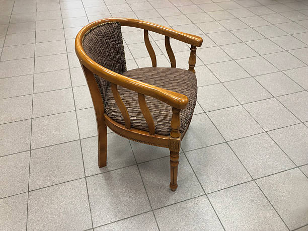 chair in an empty waiting room, no one there