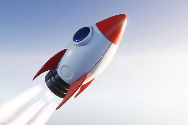Vibrant 3D cartoon rocket launching into a bright blue sky with exhaust trail. A creative concept for business startups, rapid growth, and innovative technology in a playful retro-future style.