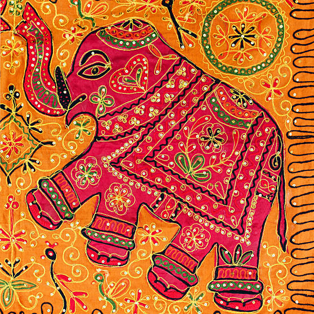 Handmade, colorful rugs for sale in one of many tourist shops in Varkala. Elephant's design is very popular in India and you can find similar or even the same rugs or bedspreads on almost every corner in Varkala, India