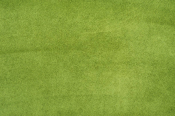 istock Green suede with scratches texture macro photo as background. 2262522970