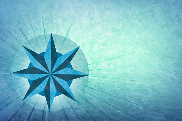 A compass rose on a blue background.