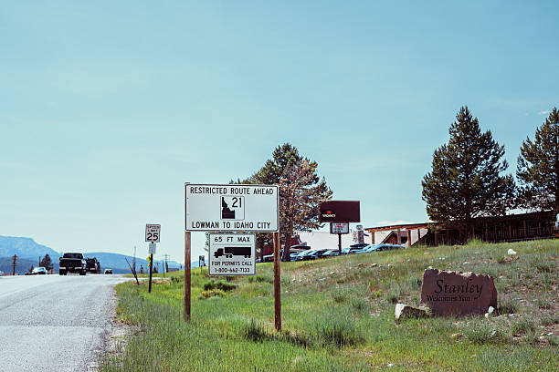 A roadside sign welcomes visitors to Stanley, Idaho, a small mountain town along a scenic Idaho highway.