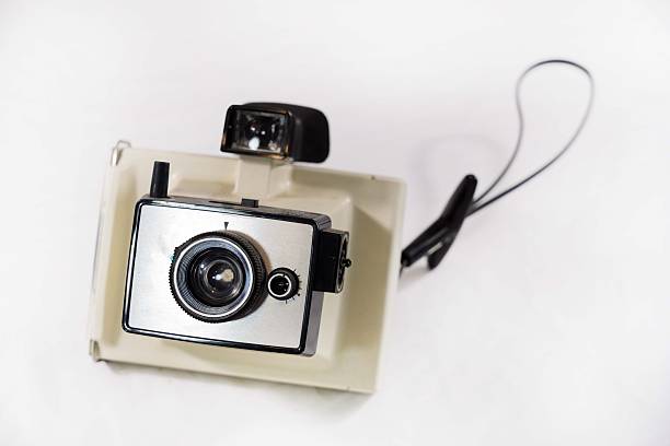 Antique Camera, Video Camera, Rubber Stamps, Props, Instant Camera, Eye Loupe, Slides, Transparencies, Camera Case, Film and Film Strip Artifacts