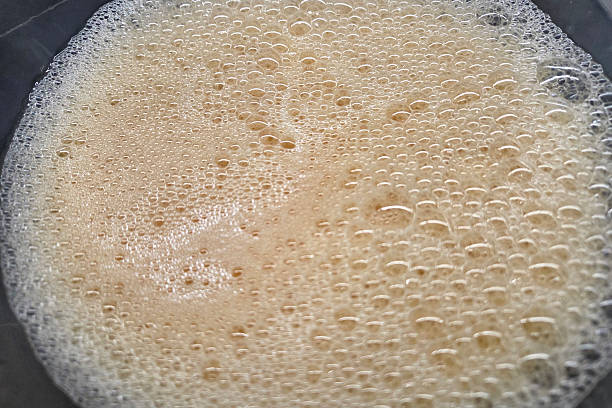 Frothy Coffee Froth Close-Up for Beverage and Culinary Design