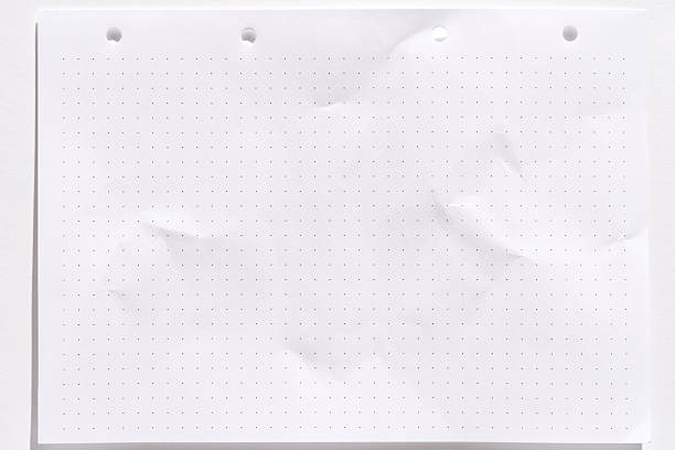 Blank dot grid paper with creases on white background for note-taking or sketching.