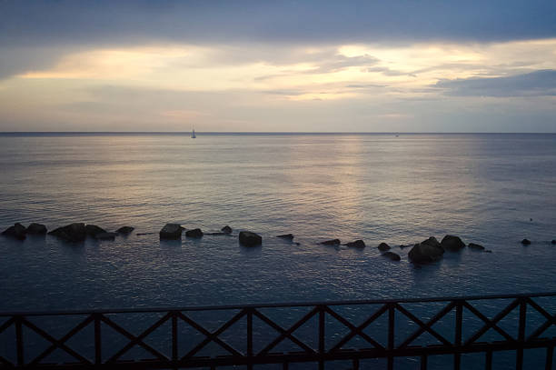 Calm sea ocean and blue clear sky background texture view