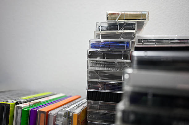Stacked cassette tapes showcasing a vintage audio media collection for music enthusiasts