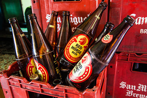 Puerto Galera, Philippines - October 9 2013Empty bottles of beer in crate
