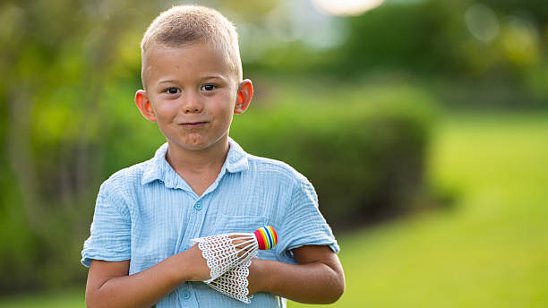 A little boy having fun while playing outdoors