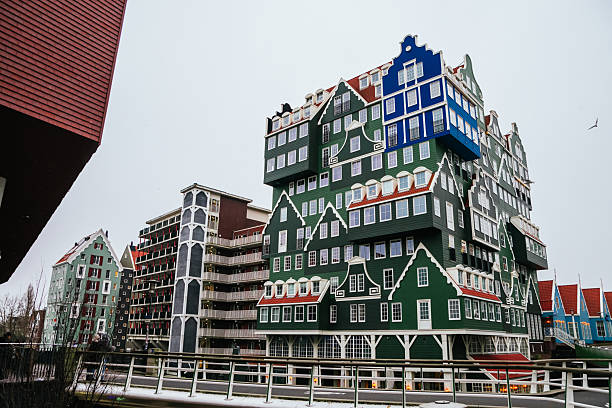 Inntel hotel in zaandam, netherlands featuring a unique architectural design replicating stacked traditional dutch houses, creating a distinctive landmark for urban travel and tourism