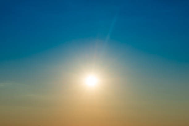 Big shining sun on sunset sky, sunset sky with sun light background