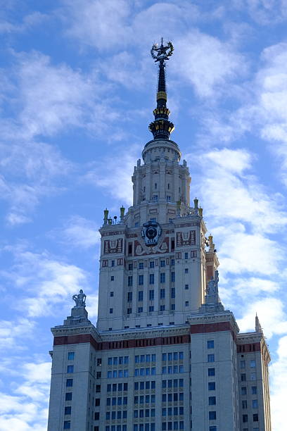Moscow State University tower on a bright winter day, clear blue sky, Soviet symbol of star