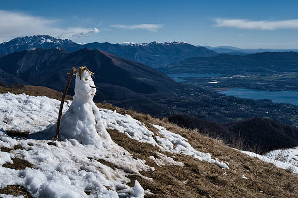 Snowman melting, Italian Alps