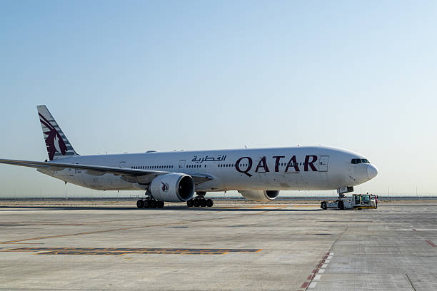 Doha, Qatar - February 15, 2026 : Qatar Airways Boeing 777-300ER at Hamad International Airport in Doha, Qatar.