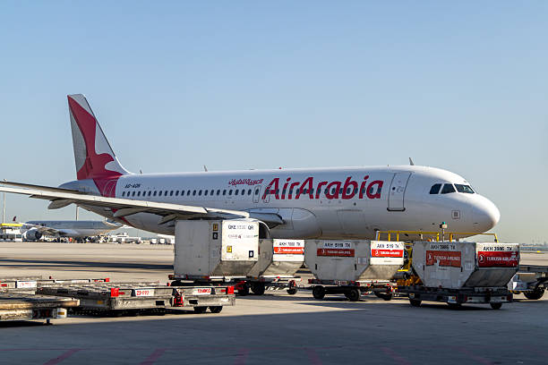 Doha, Qatar - February 15, 2026 : Air Arabia Airbus A320-200 at Hamad International Airport in Doha, Qatar.