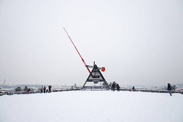 Prague, Czech republic on February 09, 2021: Prague Metronome monument in winter covered in snow