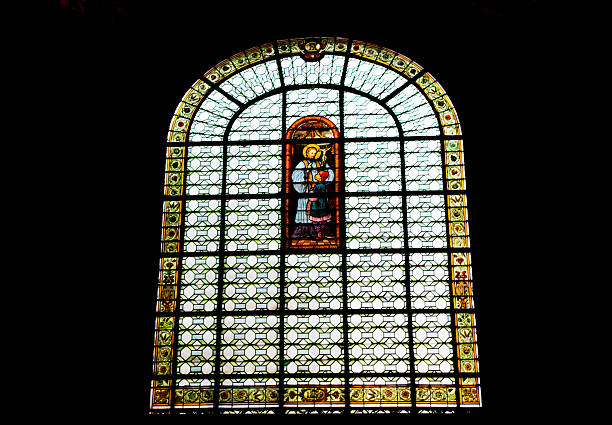 Stained glass depicting Joseph of Arimathea having a vision of the Holy Grail in the Church of the Grail, Tréhorenteuc, France