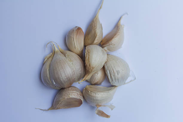 Fresh Garlic Cloves Isolated on White Background