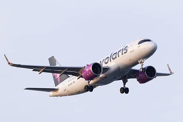 Portland, Oregon, USA - November 30, 2025: A Volaris Airbus A320 comes in for landing at Portland International Airport. Volaris is a low cost Mexican airline based in Mexico City.