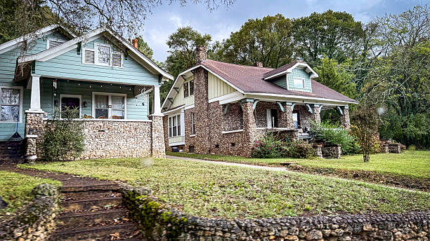 On October 21, 2025 in Chattanooga, Tennessee this is in a residential neighborhood of vintage homes. These two craft men style homes represent an example of upkeep and maintenance of a home