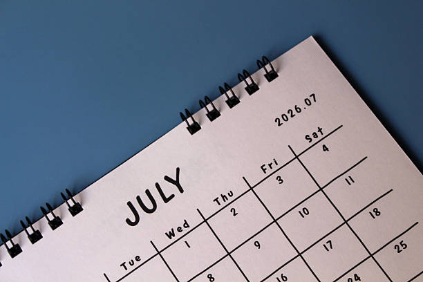 calendar for the July of 2014 on the background of summer landscape