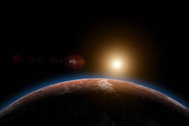 A cinematic view of the red planet's horizon featuring thin clouds and a bright sun glowing in deep space. Mars map image courtesy of NASA.