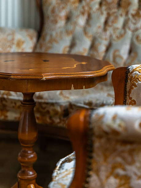 Vintage Wooden Table and Classic Upholstered Chairs in Cozy Interior