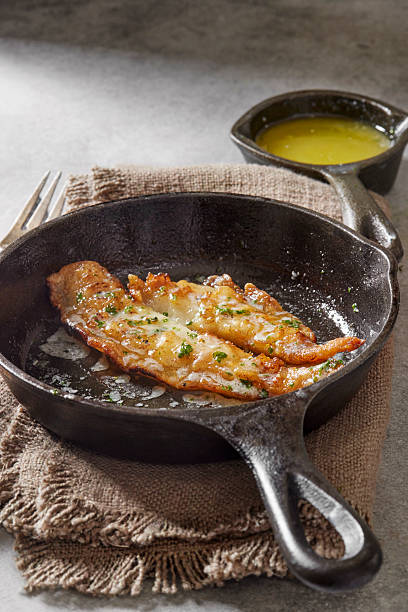 Pan Fried Cod Fillet in Cast Iron Skillet with Garlic Lemon Butter