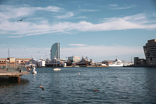 Luxury cruise ship in dry dock in Barcelona. Travel image with blue sky and ocean.