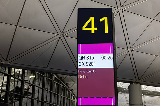Hong Kong - February 9, 2026 : Departure gate for a Qatar Airways flight to Doha at Hong Kong International Airport.