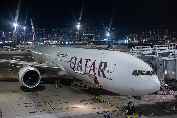 Hong Kong - February 9, 2026 : A Qatar Airways Boeing 777-300ER at Hong Kong International Airport.