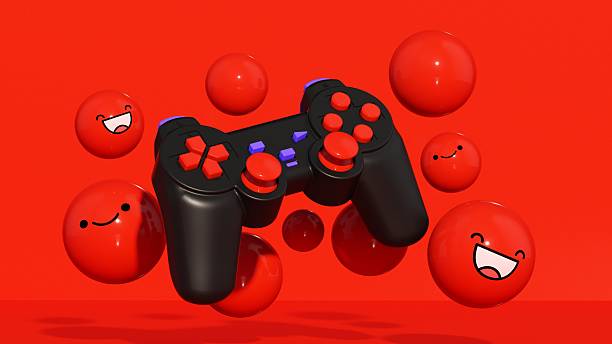 This energetic three-dimensional illustration displays a black video game controller with red accents, surrounded by floating red smiling emojis and spheres. Set against a striking red background, the composition captures the excitement and joy of the gaming community. The happy faces symbolize positive user experience, multiplayer fun, and social interaction within the gaming world. This image is ideal for esports marketing, game developer promotions, online streaming channels, and youth-oriented advertising. It perfectly conveys the passion and entertainment value of modern video gaming and digital leisure activities.