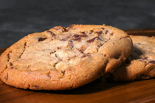 Delicious homemade chocolate chip cookies on wooden board