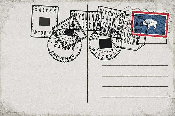 Wyoming Vintage Postcard with Flag Stamp and City Postmarks. NASA public domain imagery used as reference. Manually created, simplified country outline.
