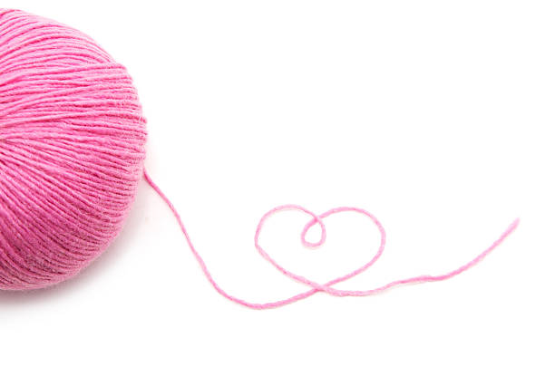 Close up on woman's hands knitting