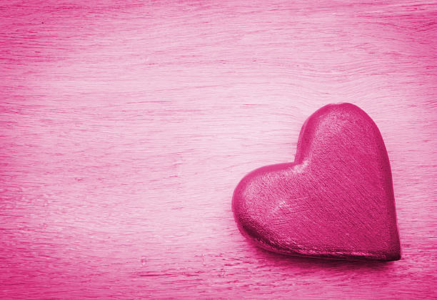 Heart on old shabby blue wooden background