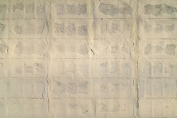 the empty clean and clear copy sapce Concrete brick block wall with the light and shadow shade on it.