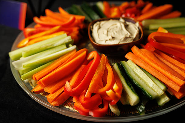 Fresh vegetable crudite platter with hummus dip