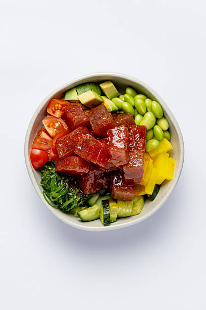 Poke bowl with tuna close up on a white background isolated for menu