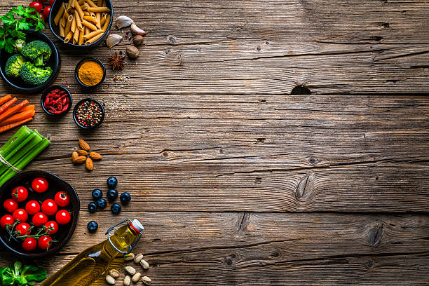 Culinary border or background. Ingredients, raw food, vegetables fruits and spices, overhead view, copy space, cooking and seasoning border. Restaurant or menu