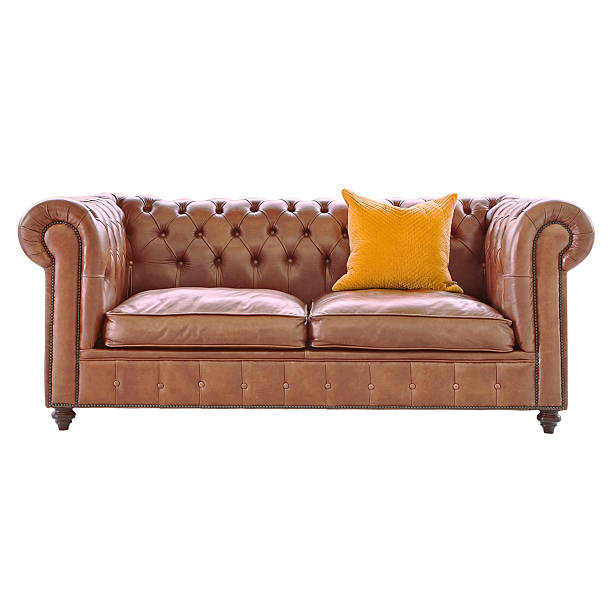 Classic Brown Leather Sofa Bed Isolated on White Background. Upholstered Loveseat with Armrests and Seat Cushion Front View. Modern Three 3 Seater Couch with Mid Back & One Yellow Scatter Pillow